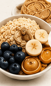 A bowl of oats, banana, blueberries and peanut butter